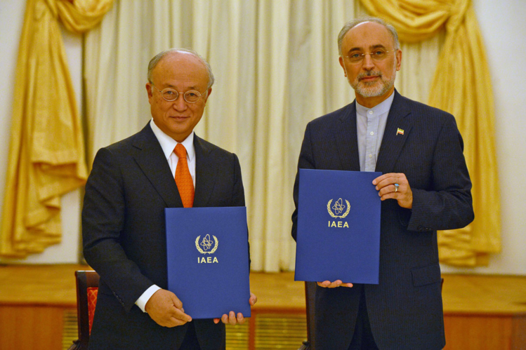 IAEA Director General Yukiya Amano and Vice President of the Islamic Republic of Iran Ali Akhbar Salehi at the signing of a roadmap for the clarification of past and present issues regarding Iran’s nuclear program in Vienna. Coburg Palace, Vienna, Austria, 14 July 2015. © Dean Calma / IAEA