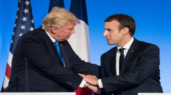 US President Donald Trump shaking hands with French President Emmanuel Macron