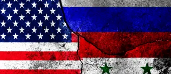 US, Russian, and Syrian flags